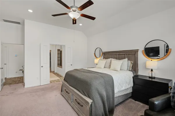 a living room with furniture and flat screen tv