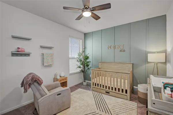a bedroom with furniture and a bed