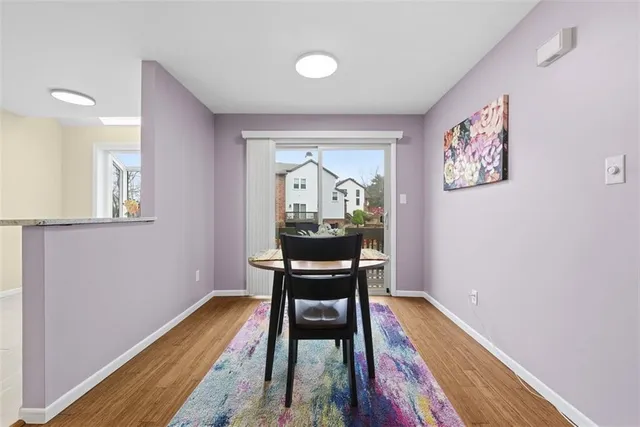 a workspace with furniture and wooden floor