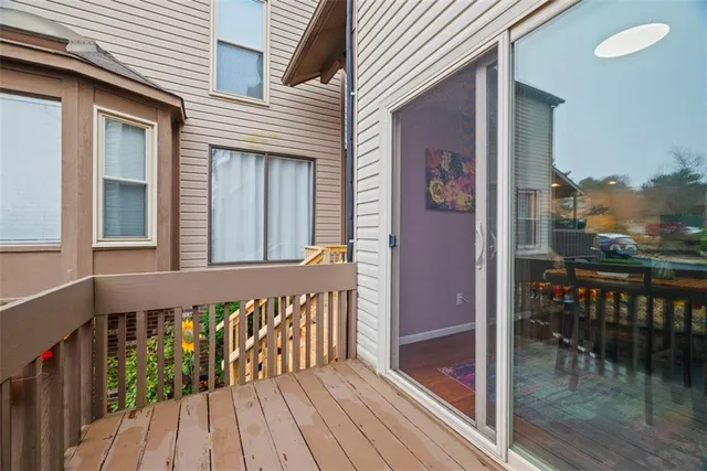 a view of a balcony with a potted plant