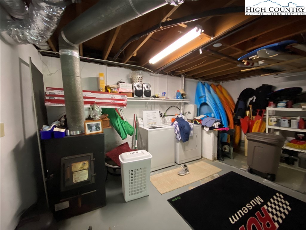 2446 3 Top Road Creston, NC 28615 - Photo 12 of 22 a view of a storage room with washer and dryer