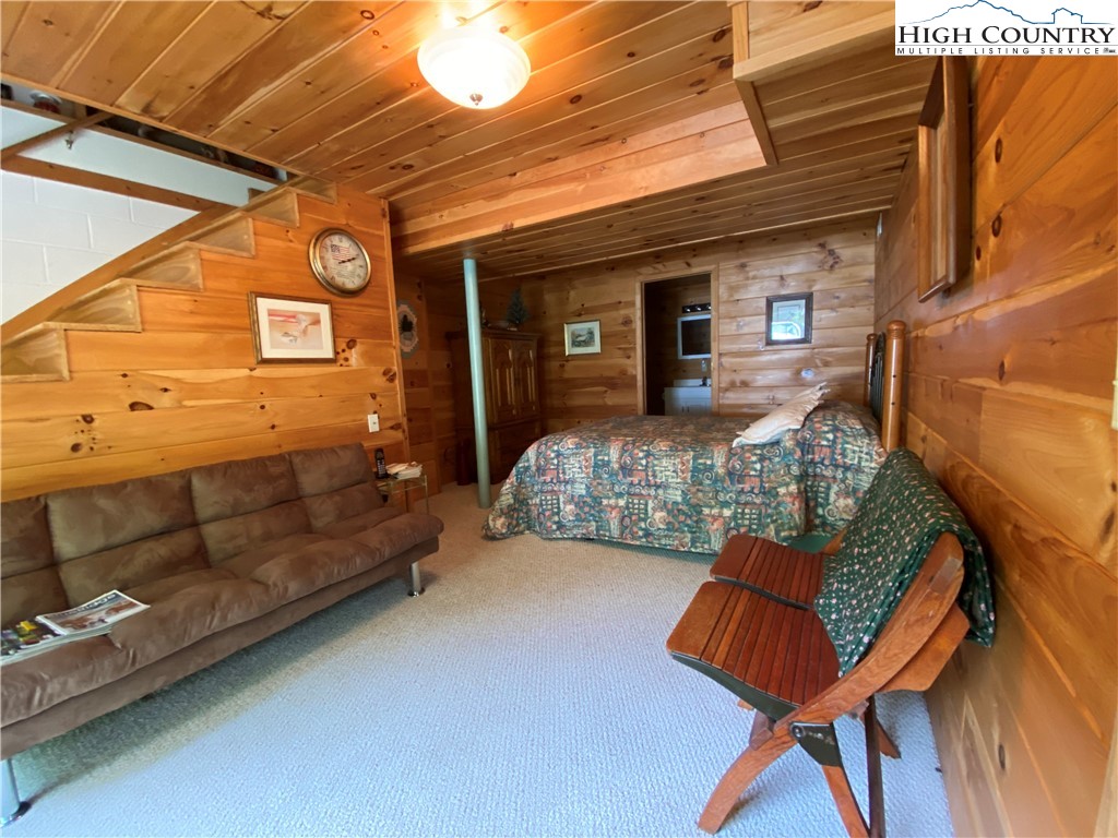 2446 3 Top Road Creston, NC 28615 - Photo 13 of 22 a view of a balcony with furniture