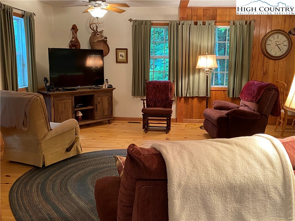 2446 3 Top Road Creston, NC 28615 - Photo 19 of 22 a living room with furniture and a flat screen tv