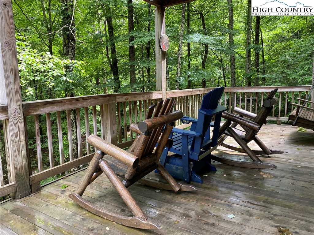 2446 3 Top Road Creston, NC 28615 - Photo 2 of 22 a view of a two chairs in the balcony