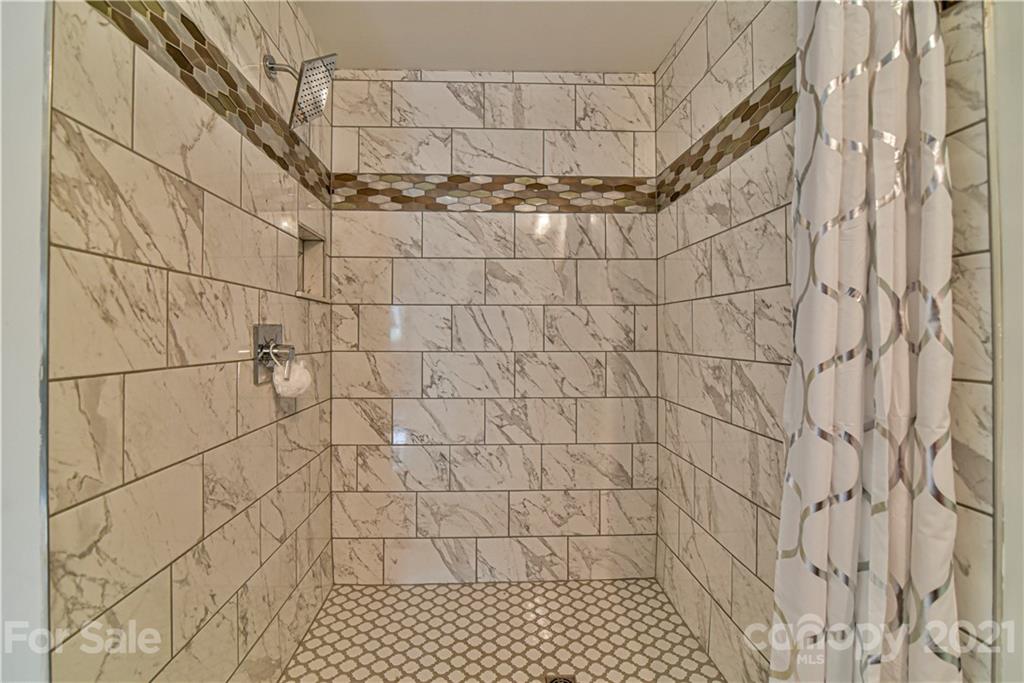 599 Pace Road Hendersonville, NC 28792 - Photo 16 of 24 a bathroom with a shower
