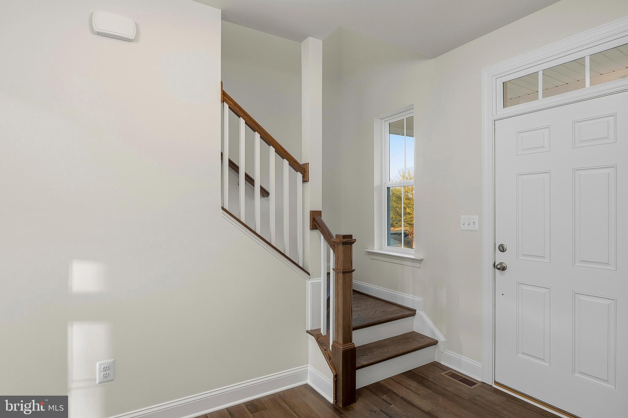 6715 Old Waterloo Road Elkridge, MD 21075 - Photo 20 of 41 Foyer and Steps to Upper Level