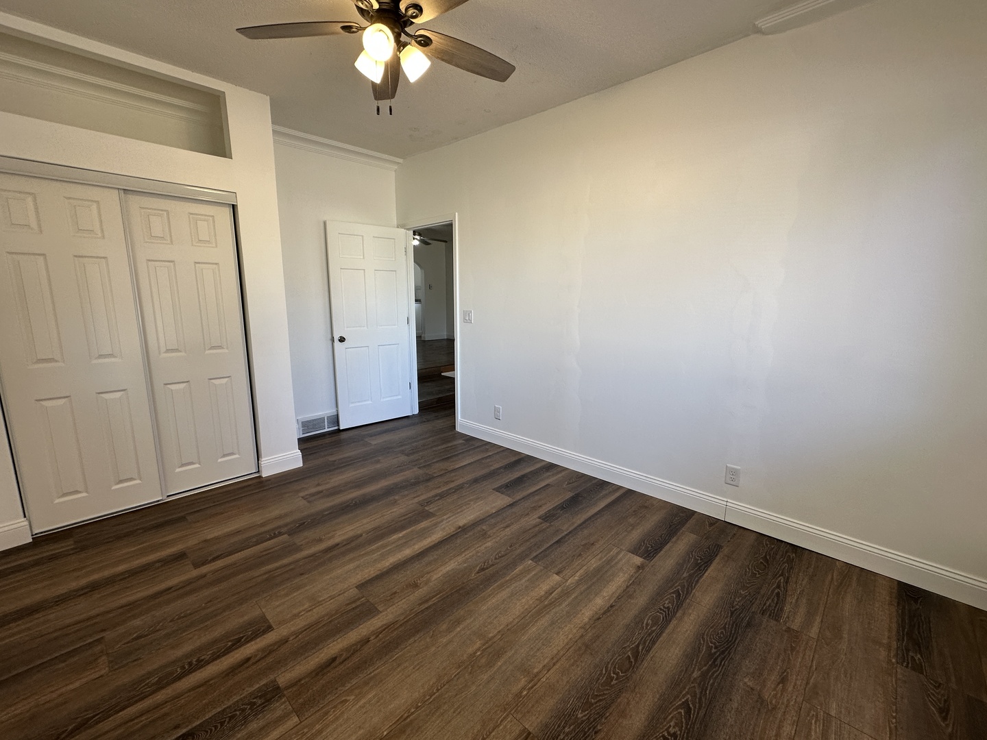 1202 East Jefferson Street Clinton, IL 61727 - Photo 8 of 19 wooden floor in an empty room