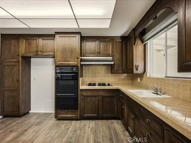 a view of a livingroom with wooden floor