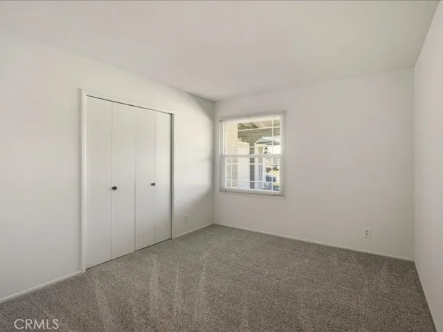 a view of swimming pool with a yard