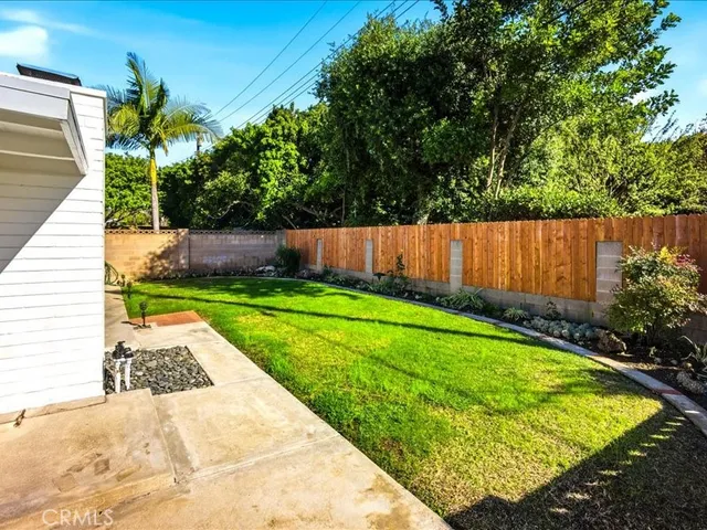 a view of house with yard