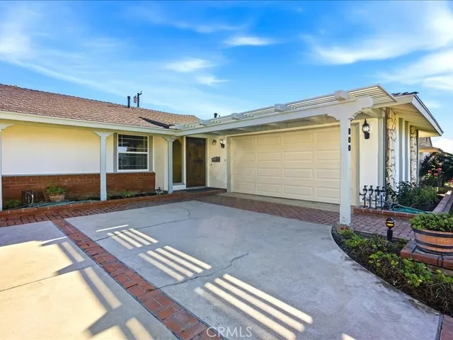 a view of house with yard