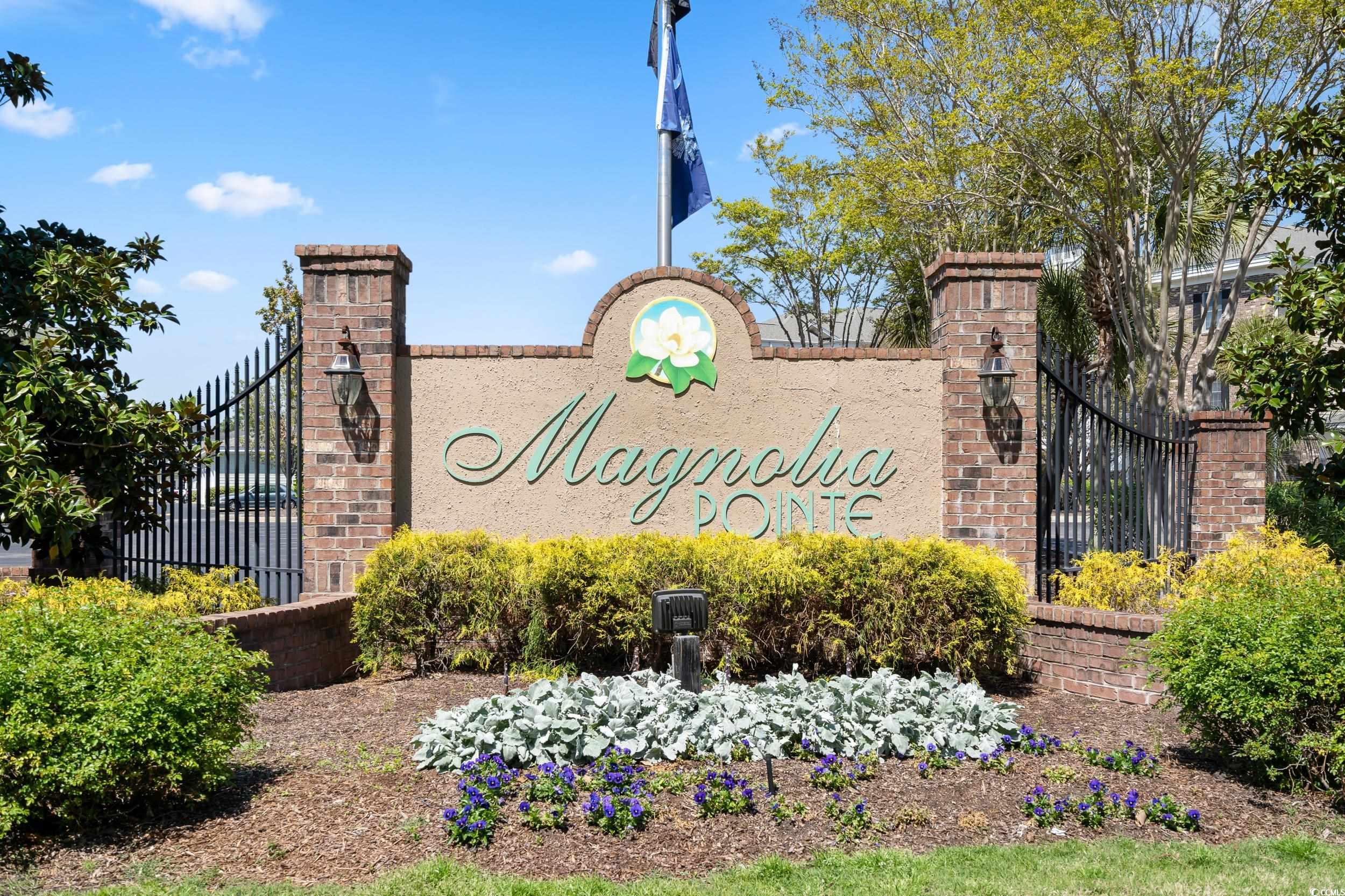 4823 Magnolia Lake Drive, Unit 101 Myrtle Beach, SC 29577 - Photo 31 of 35 View of community / neighborhood sign