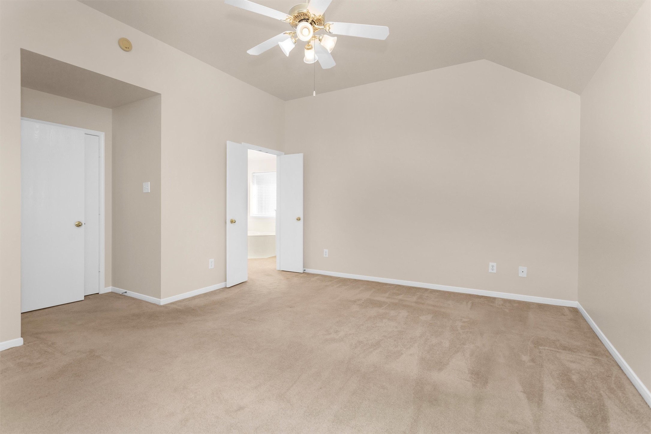 2615 Honeysuckle Walk Spring, TX 77388 - Photo 22 of 39 a view of an empty room with a chandelier fan