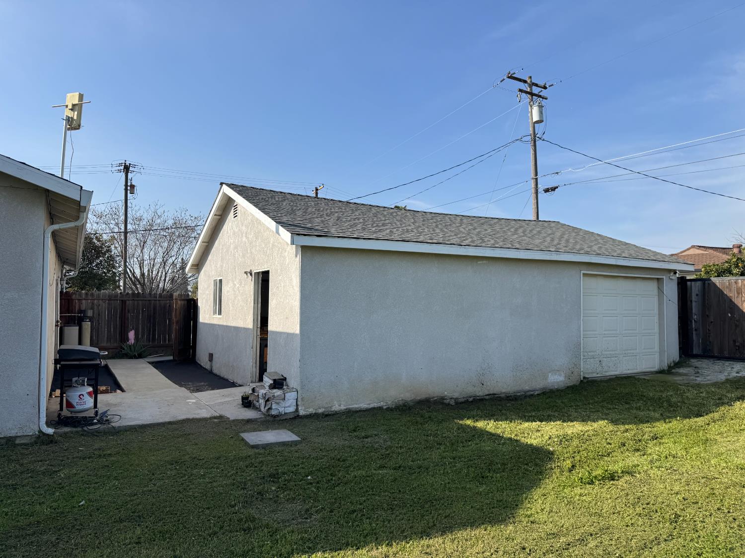 1650 North Olive Avenue Turlock, CA 95382 - Photo 18 of 21 a view of a backyard of the house