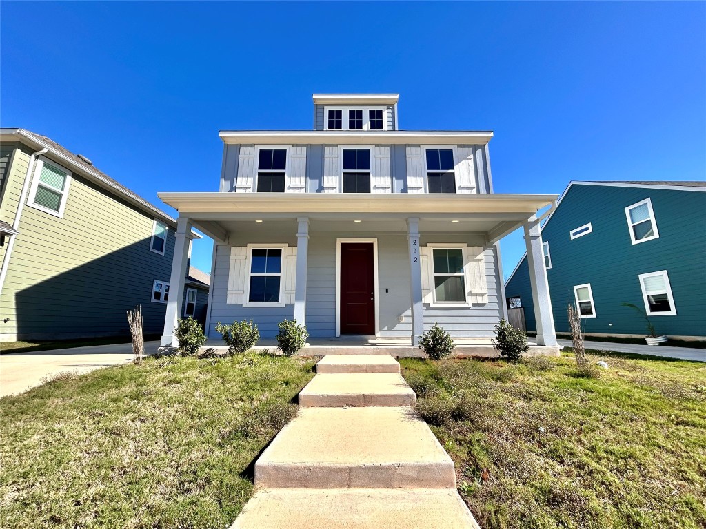 202 Pebblestream Pass Taylor, TX 76574 - Photo 1 of 35 a front view of a house with a yard