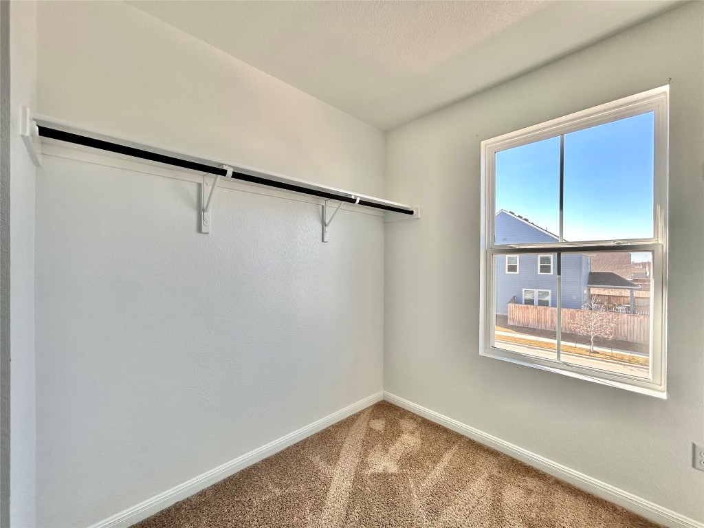 202 Pebblestream Pass Taylor, TX 76574 - Photo 23 of 35 a view of an empty room with a window