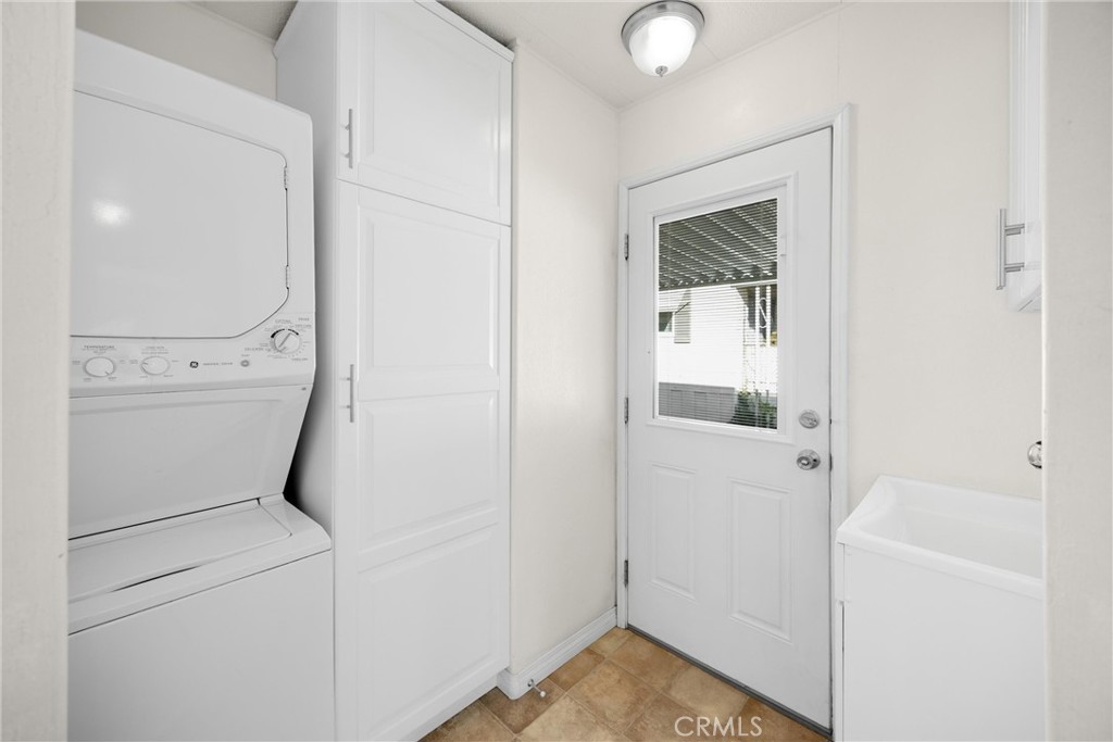 10210 Base Line Road, Unit 291 Rancho Cucamonga, CA 91701 - Photo 12 of 27 a view of bathroom with washer and dryer