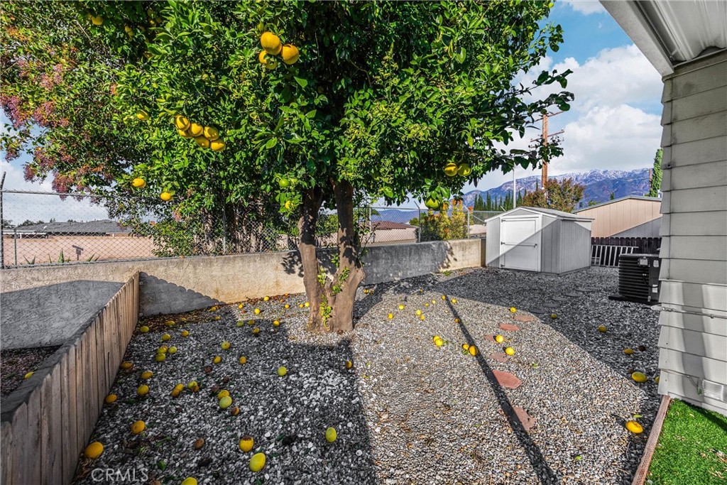 10210 Base Line Road, Unit 291 Rancho Cucamonga, CA 91701 - Photo 7 of 27 a view of a backyard with sitting area