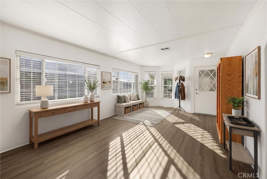 10210 Base Line Road, Unit 291 Rancho Cucamonga, CA 91701 - Photo 9 of 27 a spacious bedroom with a large bed and a large window