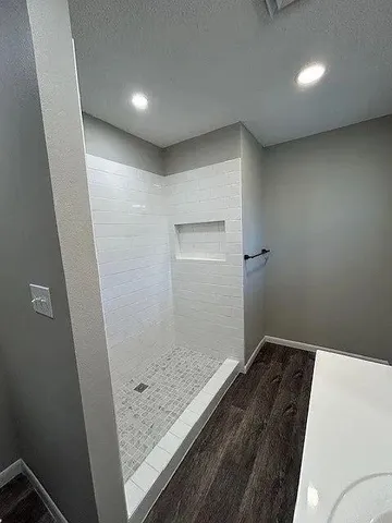 a view of an empty room with empty shelves