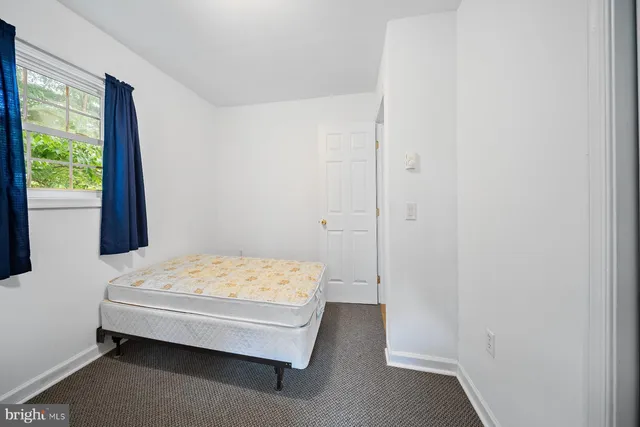 a bathroom with a sink toilet a mirror and shower