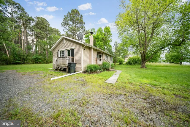 a view of a backyard with a garden