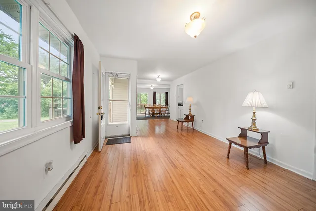 a living room with furniture and a table