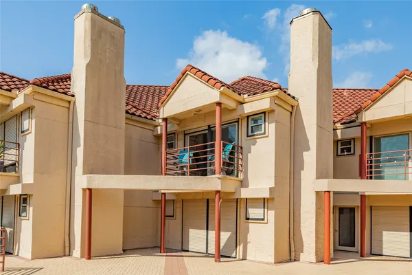 a front view of a building with a outdoor space