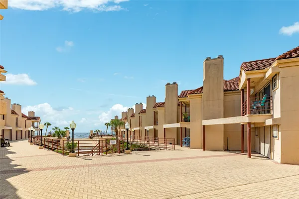 a view of a building with a street