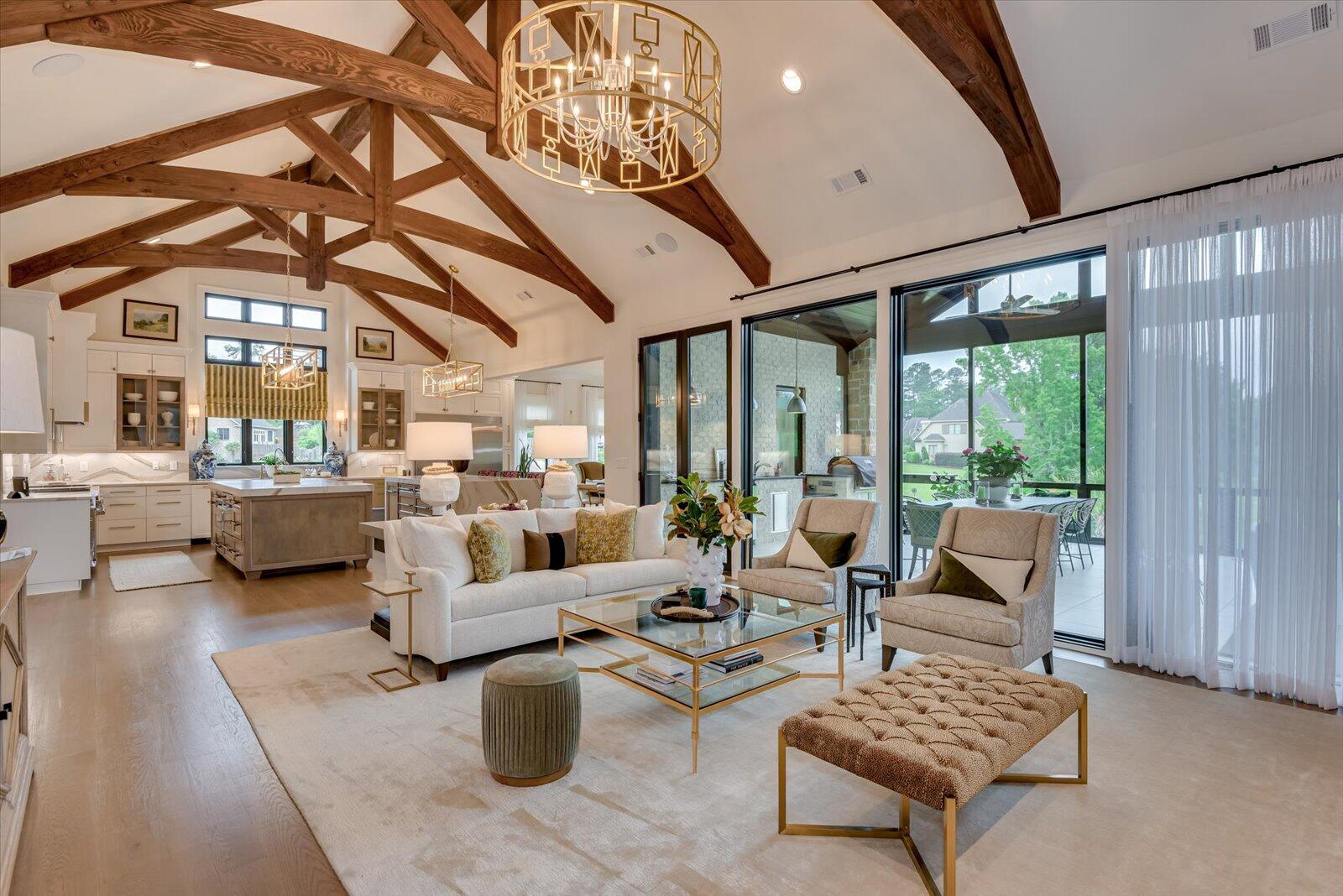 2025 Grace Avenue Evans, GA 30809 - Photo 12 of 67 Solid Colorado cedar beams w/ wood peg connections. Bespoke commissioned lighting fixture.