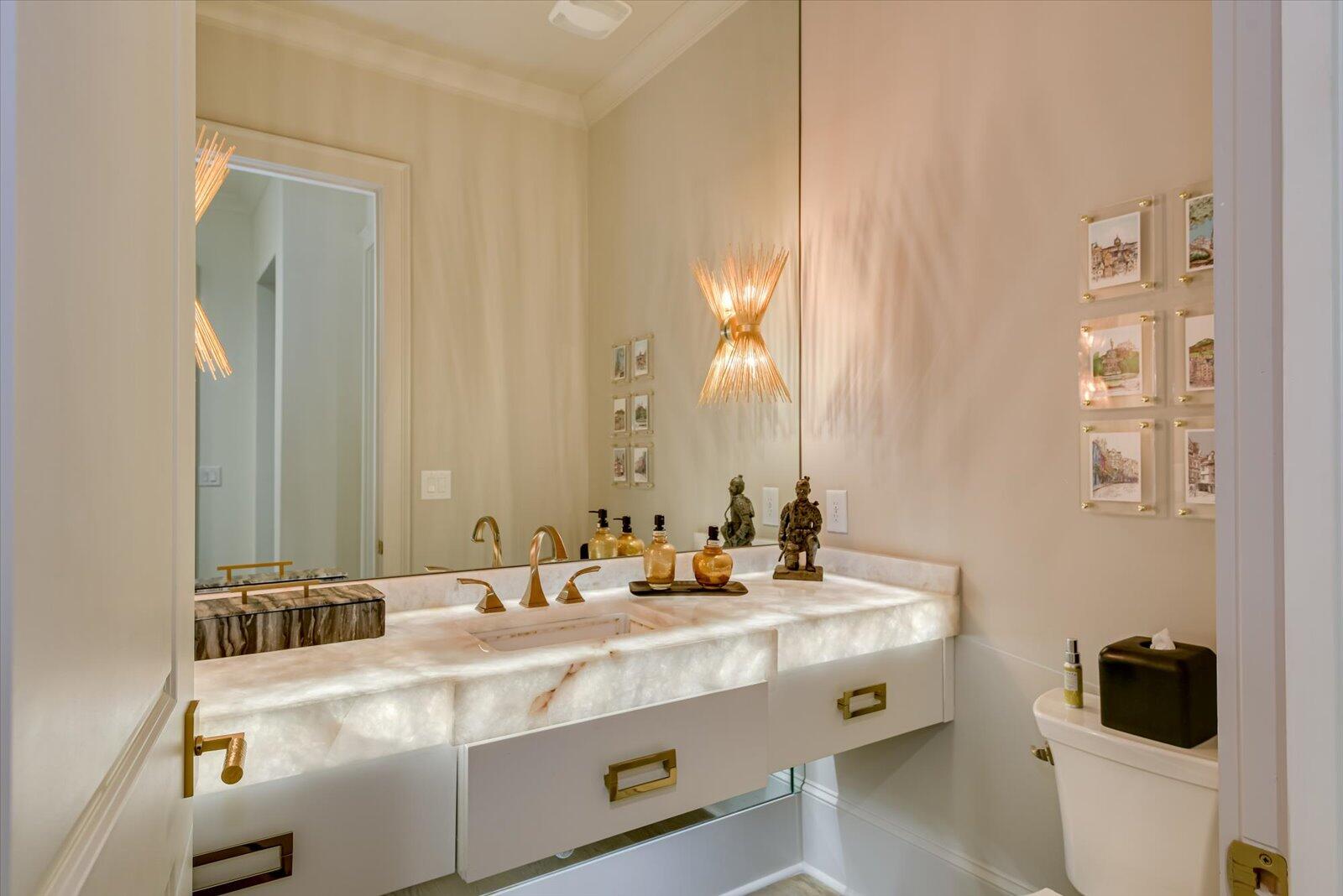 2025 Grace Avenue Evans, GA 30809 - Photo 30 of 67 Powder Room- Backlit Quartzite countertop. Oyster shell sink. Brizo faucet.