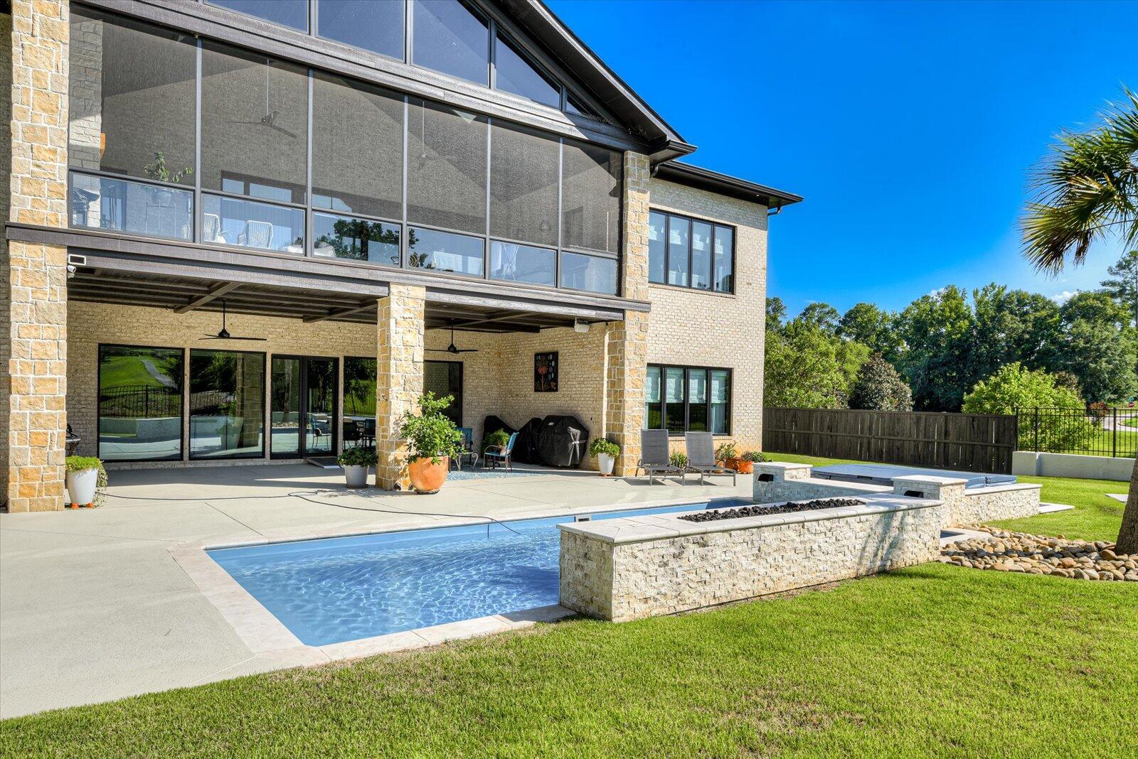 2025 Grace Avenue Evans, GA 30809 - Photo 54 of 67 Spa- Spa enclosure wall w/ 2- 6” waterfalls. Spa-Marquie V94: seats 8