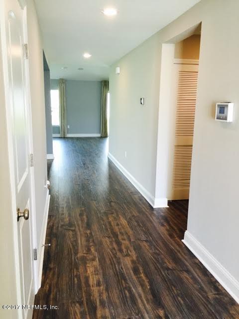63 Redland Way Jacksonville, FL 32218 - Photo 2 of 14 a view of entryway with wooden floor