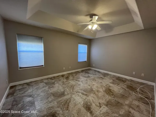 a bathroom with a double vanity sink toilet and shower