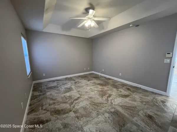 a bathroom with a tub sink toilet and mirror