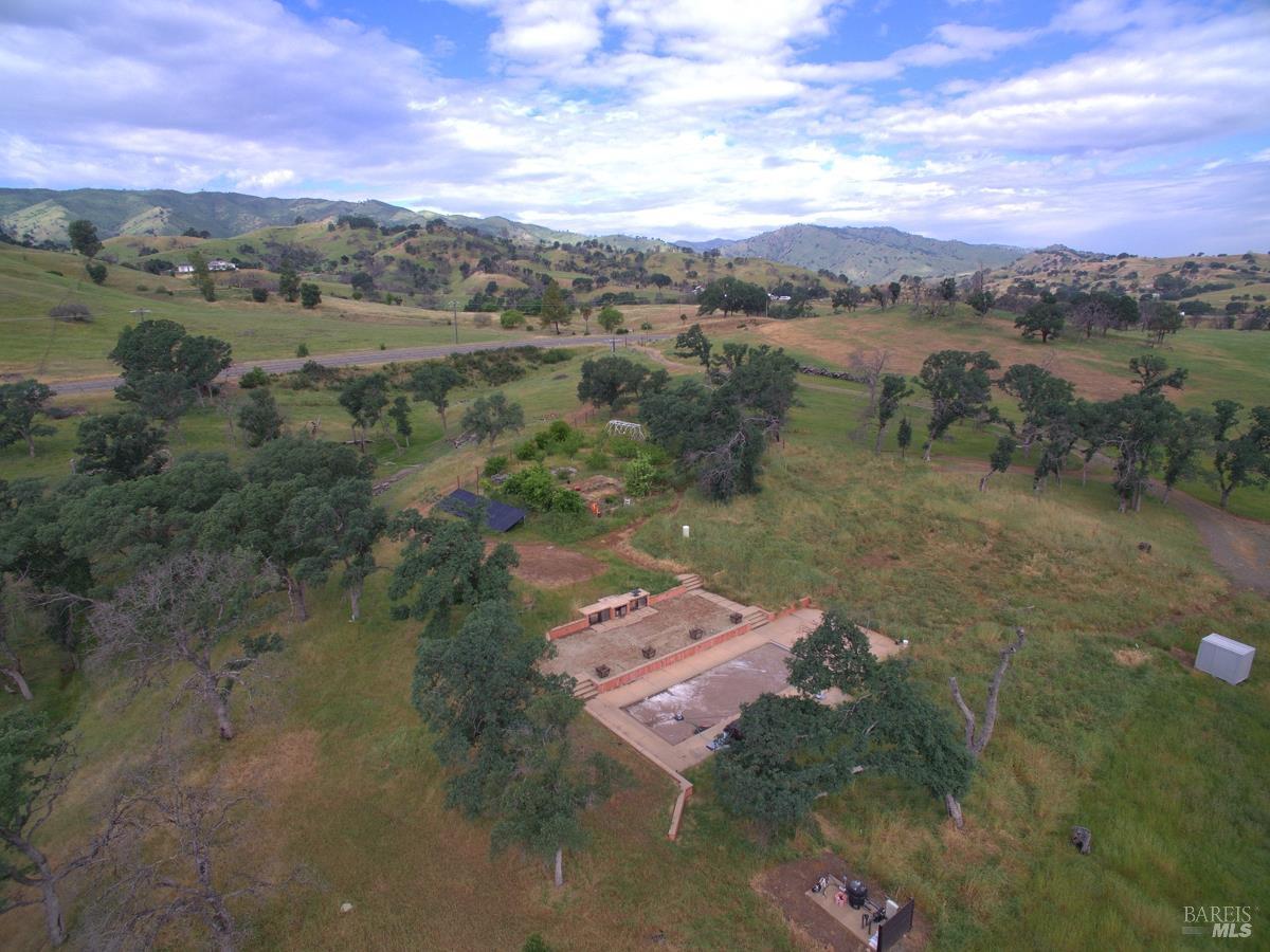 8600 Pleasants Valley Road Winters, CA 95694 - Photo 12 of 35 Aerial of the pool and large patio around it.