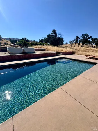 a view of a yard with ocean view