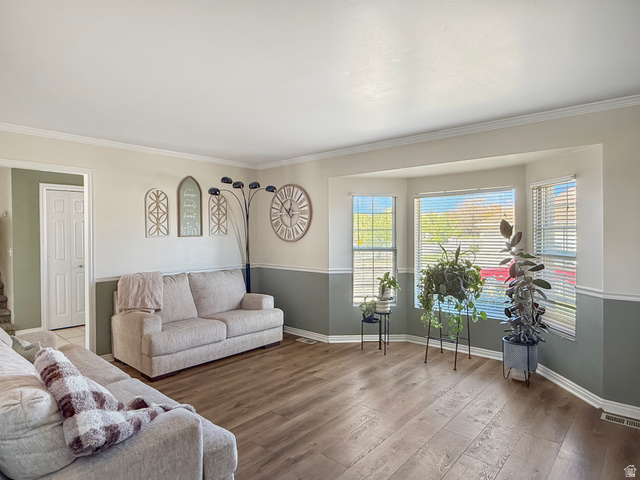 1716 Sagewood Road Price, UT 84501 - Photo 3 of 73 Living room with hardwood / wood-style flooring and crown molding