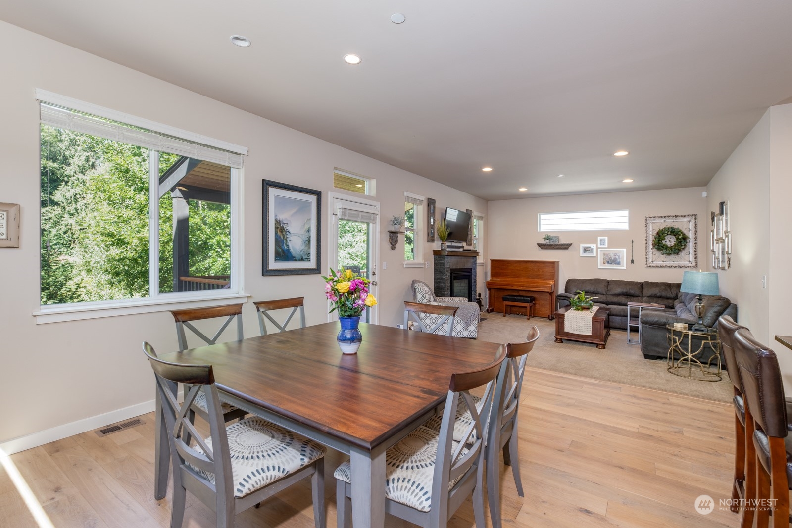 4408 Forest Drive Everett, WA 98203 - Photo 13 of 32 a view of a dining room with furniture window and wooden floor