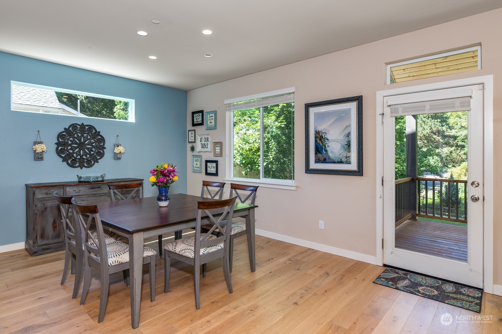 4408 Forest Drive Everett, WA 98203 - Photo 14 of 32 a view of a dining room with furniture window and wooden floor
