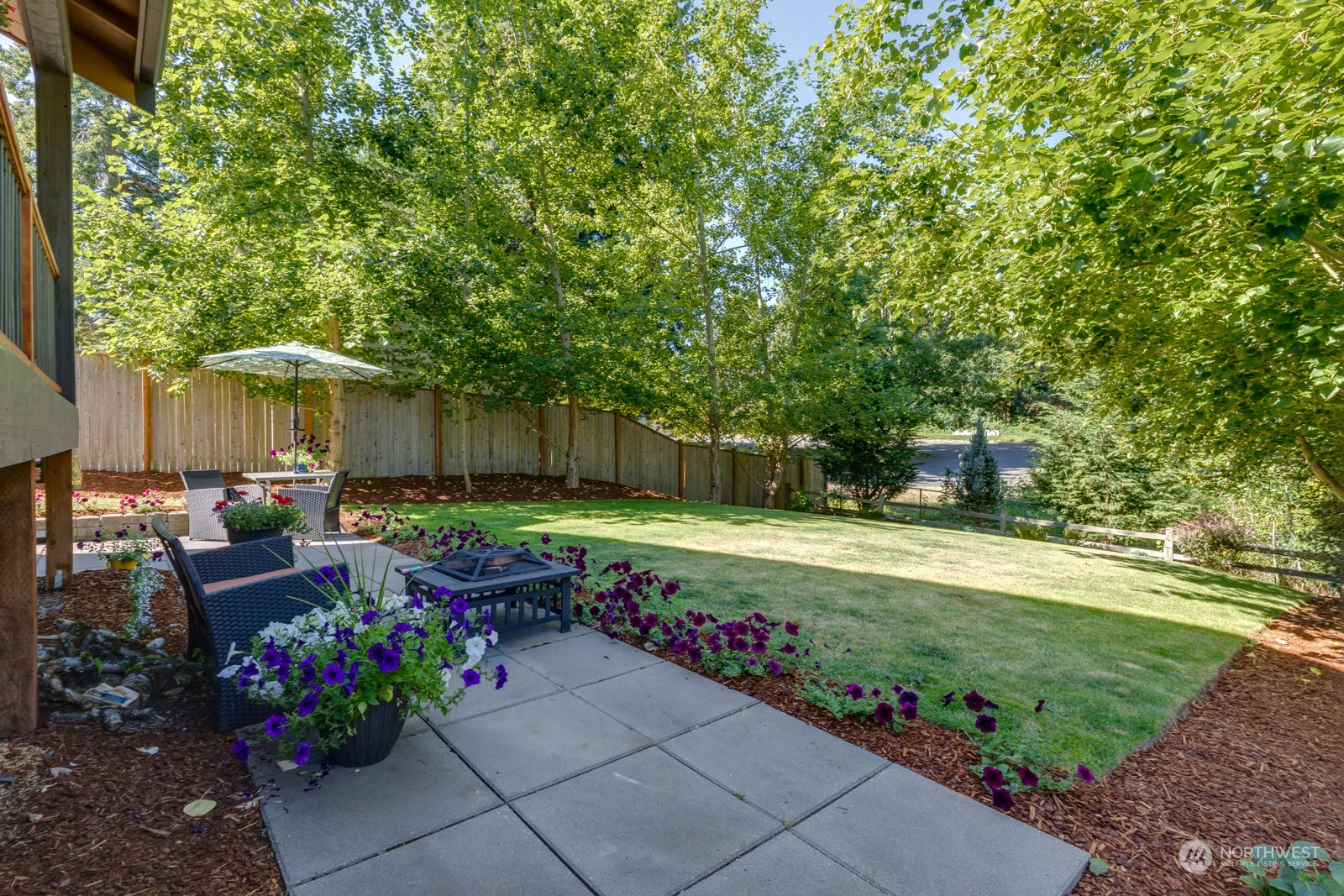 4408 Forest Drive Everett, WA 98203 - Photo 2 of 32 a view of a garden with patio