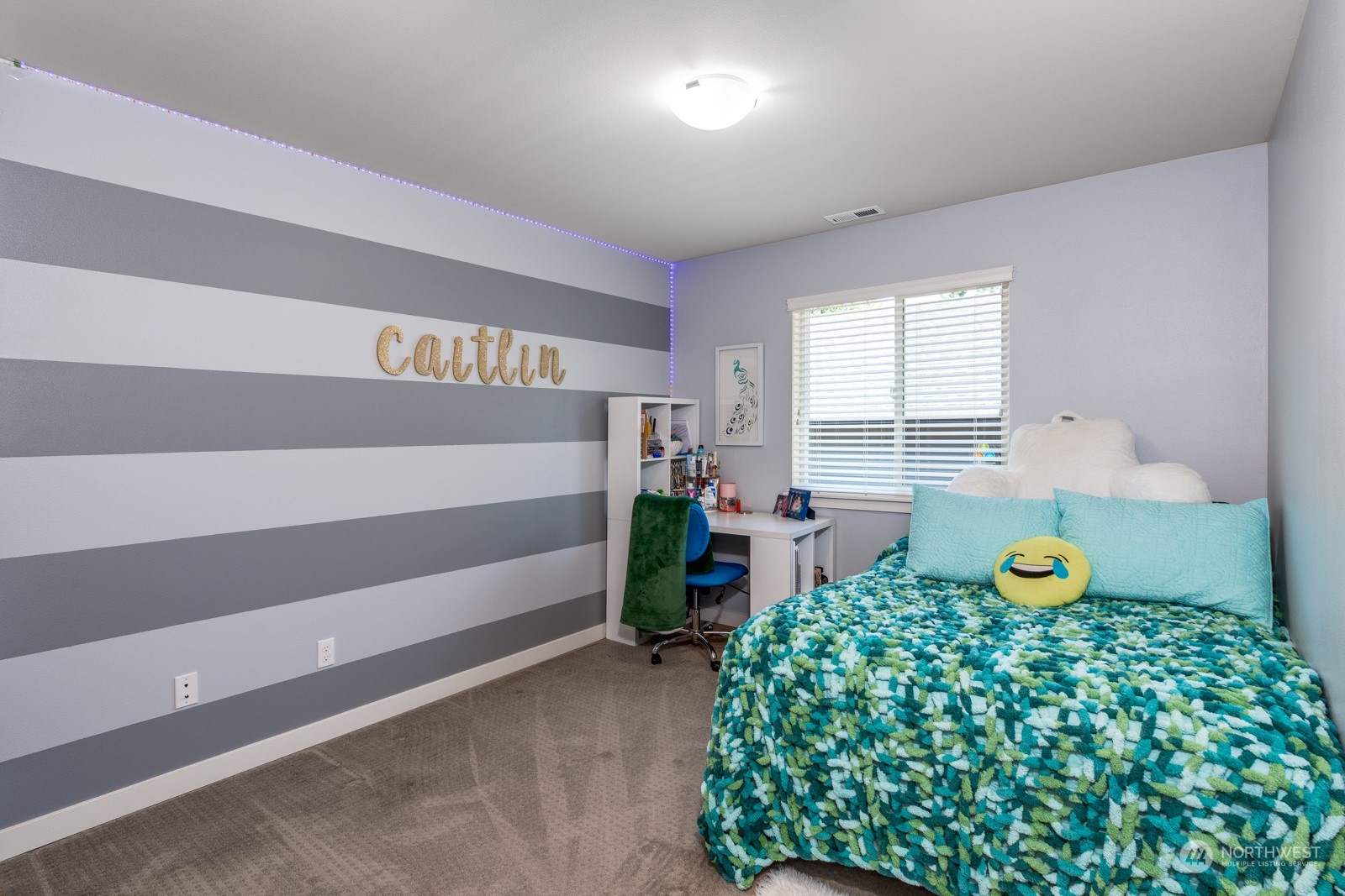 4408 Forest Drive Everett, WA 98203 - Photo 23 of 32 a bedroom with a bed and a window