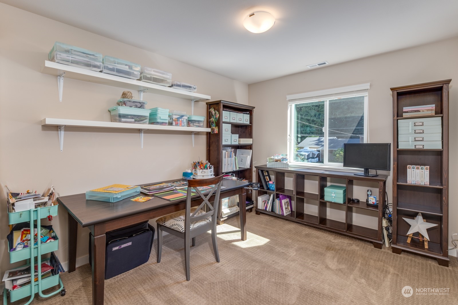 4408 Forest Drive Everett, WA 98203 - Photo 25 of 32 a view of a dining room with furniture and a window