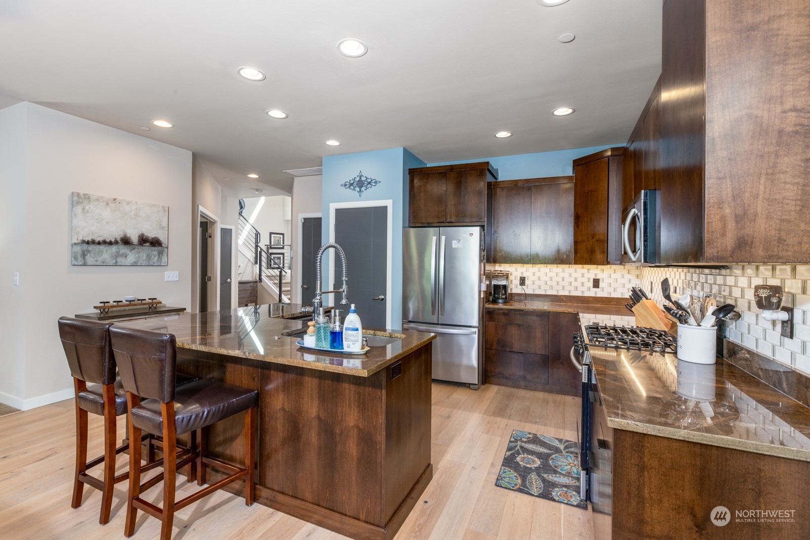 4408 Forest Drive Everett, WA 98203 - Photo 8 of 32 a kitchen with refrigerator and chairs