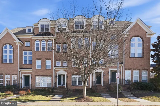 a front view of a building with garden