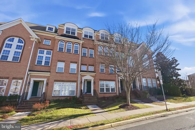 a front view of a building with street view