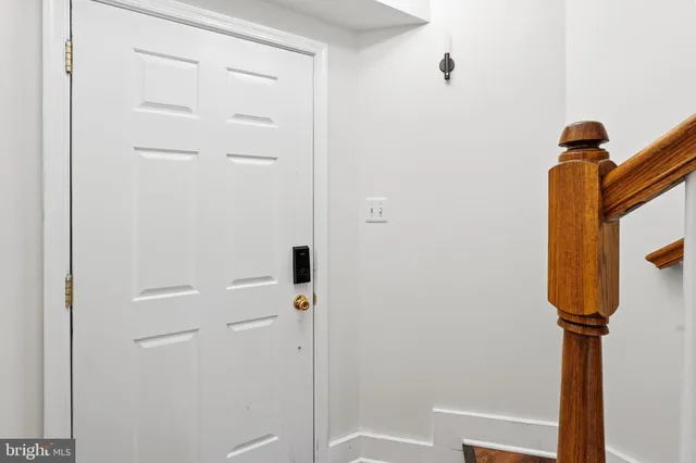 a view of a hallway with storage
