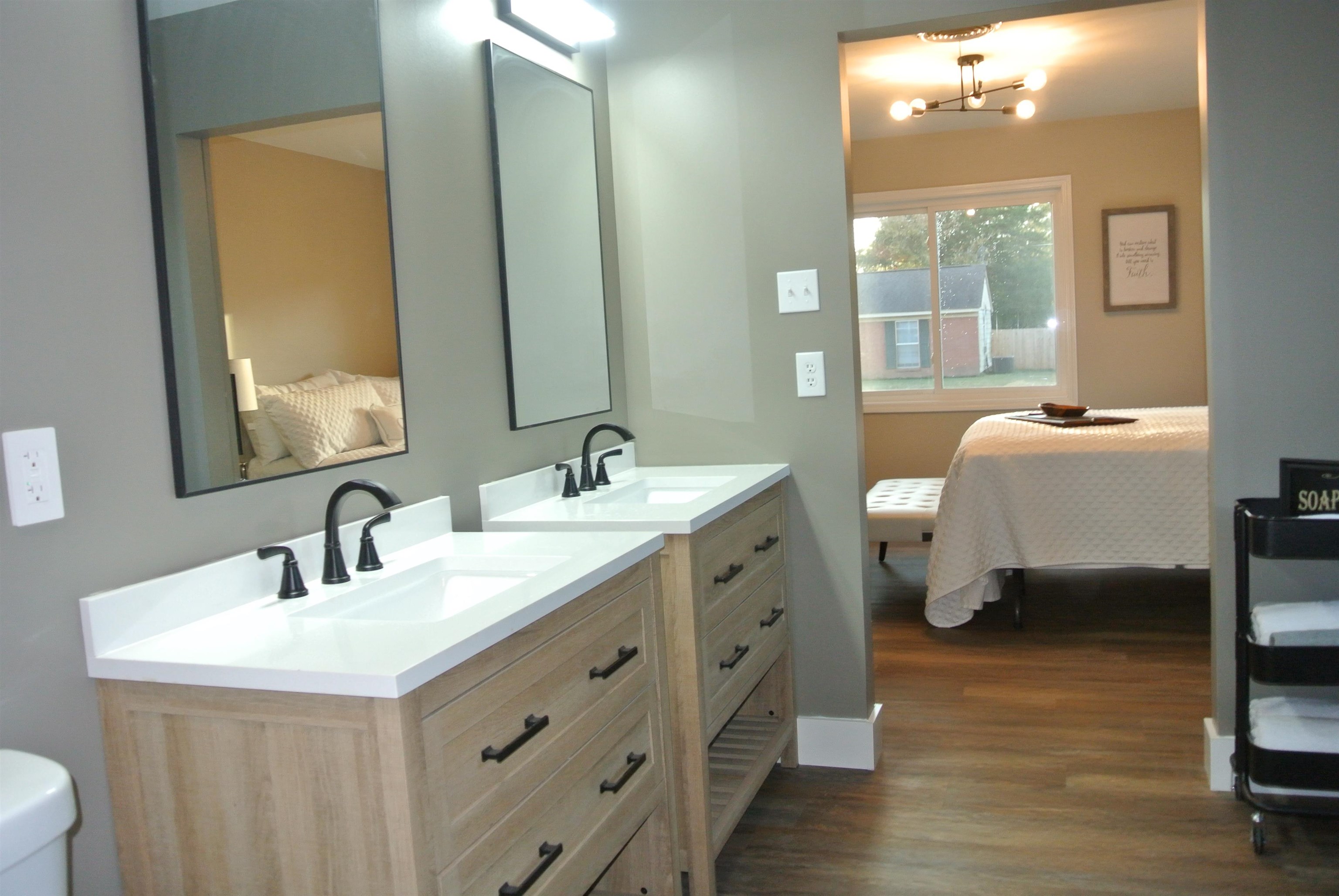 948 Greencliff Road Collierville, TN 38017 - Photo 24 of 34 a bathroom with a double vanity sink mirror and bathtub