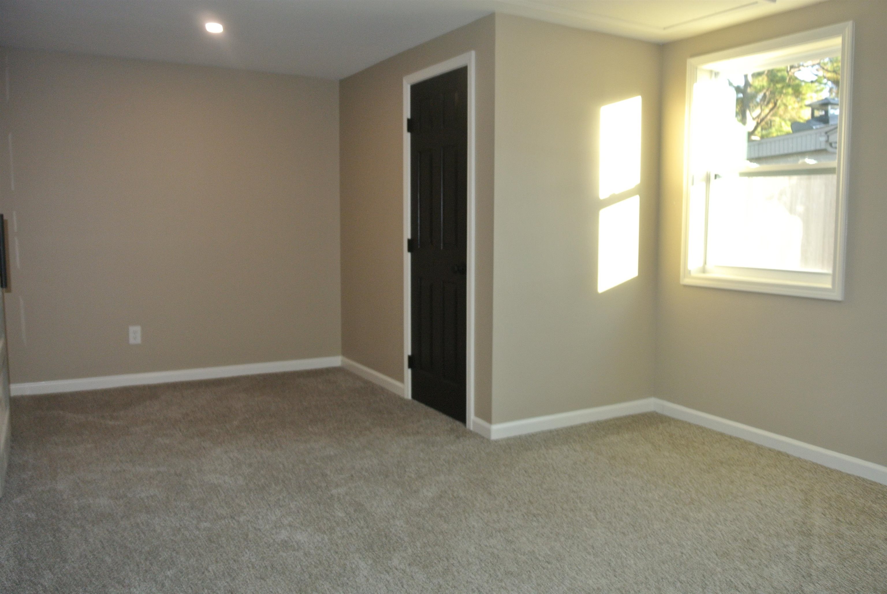 948 Greencliff Road Collierville, TN 38017 - Photo 32 of 34 an empty room with windows