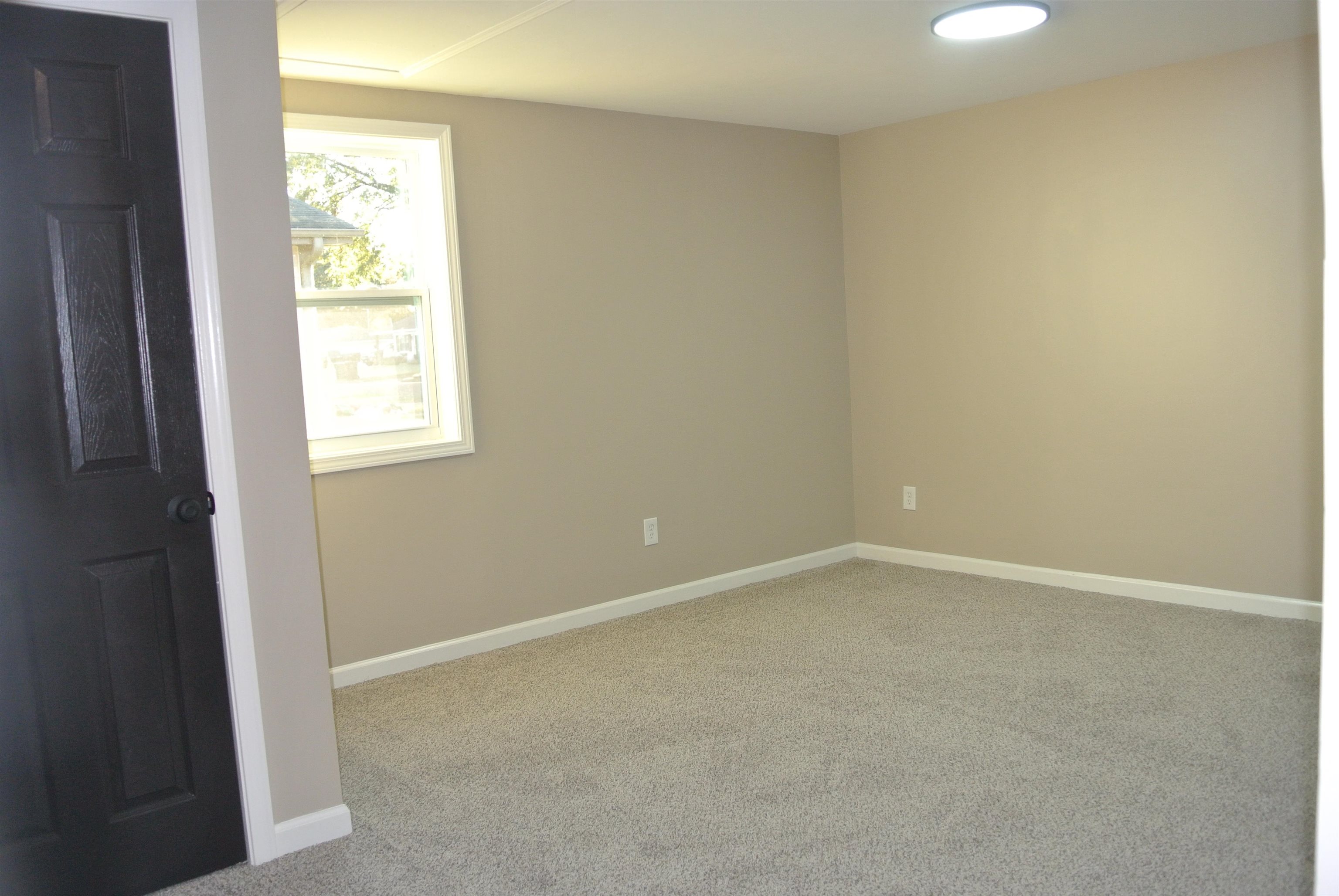 948 Greencliff Road Collierville, TN 38017 - Photo 33 of 34 an empty room with windows